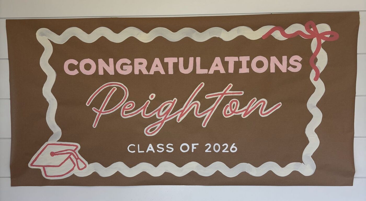 Hand-painted banner: Congratulations Peighton, class of 2026