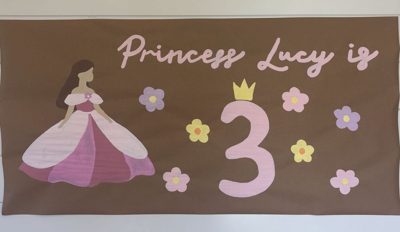Hand-painted banner: Princess Lucy is 3, birthday