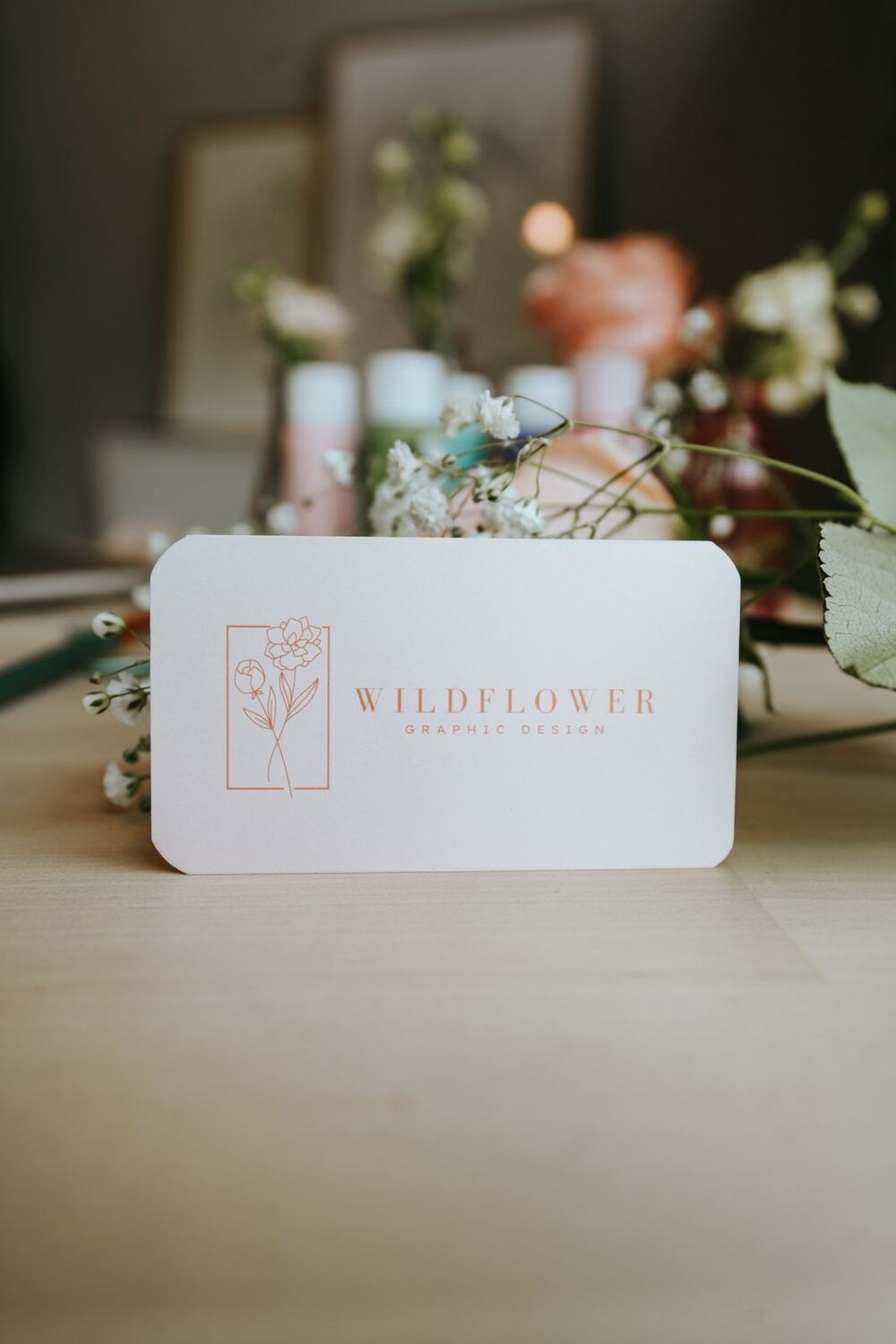 Wildflower Graphic Design business card with flowers